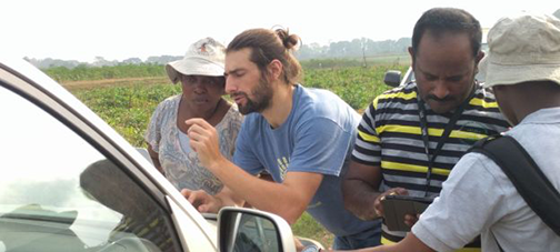 Feature Image: Guillaume Bauchet (2nd from left) guides workshop participants through a field exercise during the 2017 NextGen Cassava annual meeting. Photo by Bryan Ellerbrock.