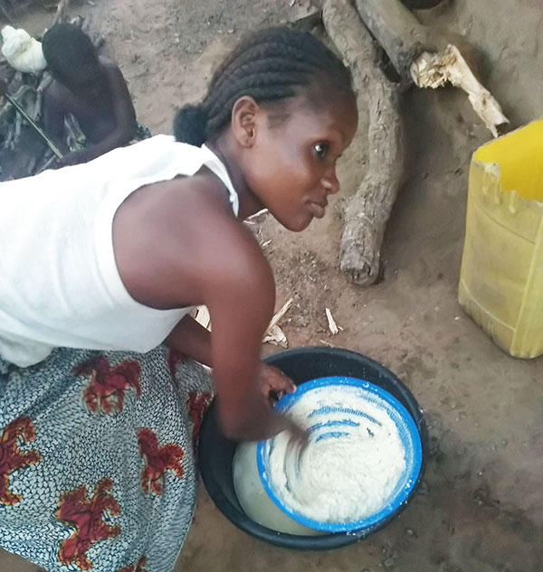 Woman with cassava flour